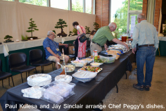 Paul Kulesa and Jay Sinclair Arrange Chef Peggy's Dishes